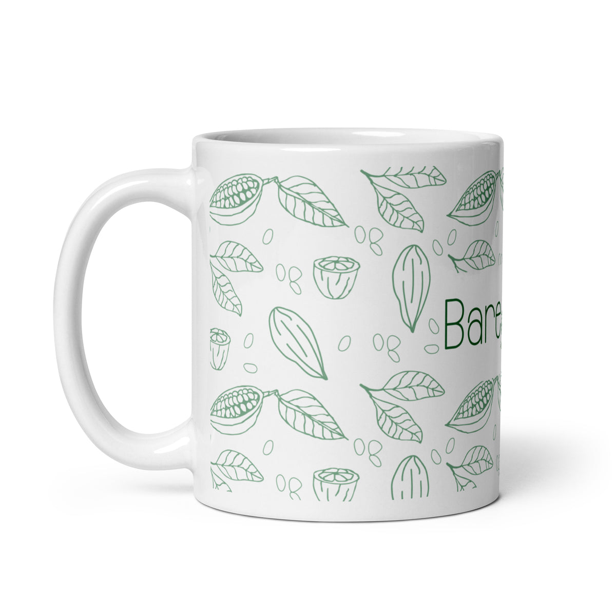 Image of a white ceramic mug featuring the Bare Life logo in green. The design includes illustrations of cacao pods, leaves, and beans, evoking a natural and organic feel. This mug is ideal for enjoying a cup of dairy-free, gluten-free, refined sugar-free, soy-free, plant-based, vegan, non-GMO, Paleo, organic, and kosher hot cocoa.